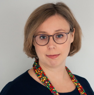 portrait of a female web developer wearing glasses